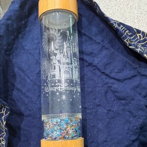 Glass Walt Disney Castle Water Bottle with Bamboo Lid and Glitter Accents.